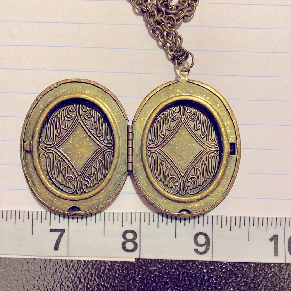 Costume Jewelery locket with long chain good condition. Purchase two items Free - Picture 3 of 3